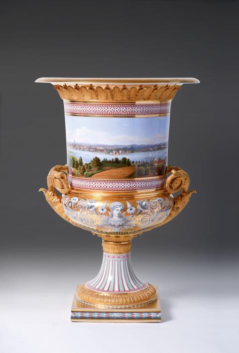 
    Königliche Porzellanmanufaktur Berlin KPM, 1836. The vase modelled by Johann Carl Friedrich RA monumental Berlin KPM ormolu-mounted porcelain krater form vase with a view of Potsdam., Auction 1047, Lot 184
