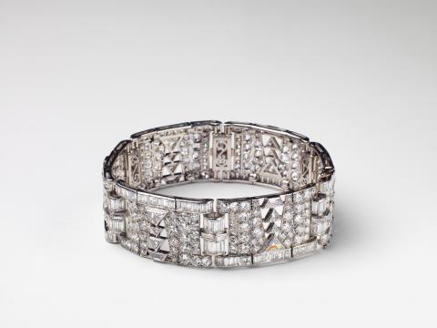 
    Maison Boucheron, Paris, ca. 1930.A French platinum, 18k gold and diamond Art Deco bracelet with Boucheron retailer's mark, Auction 1066, Lot 106
