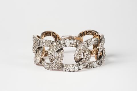 
    2nd half 19th C., using old stones.A Ducal 18k red gold, silver and diamond bracelet, Auction 1075, Lot 59
