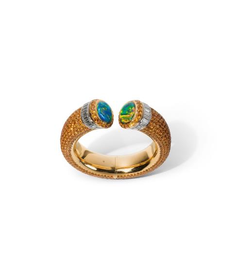 
    Gebrüder Hemmerle, Hemmerle, Munich.An 18k gold and harlequin opal cocktail bracelet, Auction 1096, Lot 708
