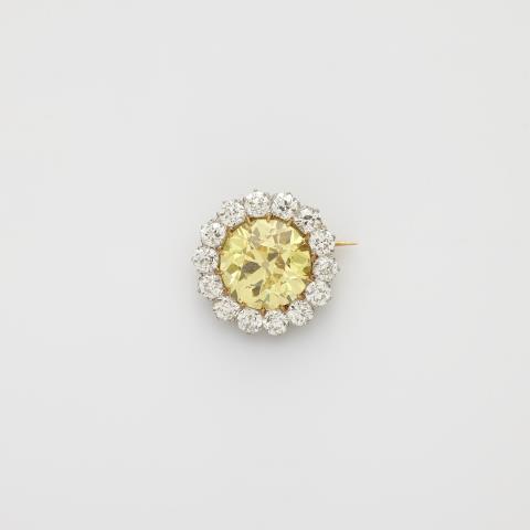 
    
            
                    An 18k gold and diamond Art Déco brooch with an important fancy vivid yellow diamond.
                
        
