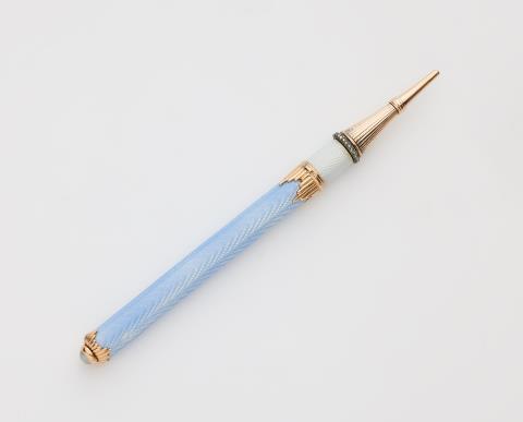 
    
            
                    A Russian jewelled 14 k gold and translucent guilloche enamel twisting pencil.
                
        
