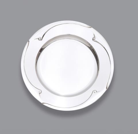 
    
            
                    A large silver plate by Henry van de Velde
                
        

