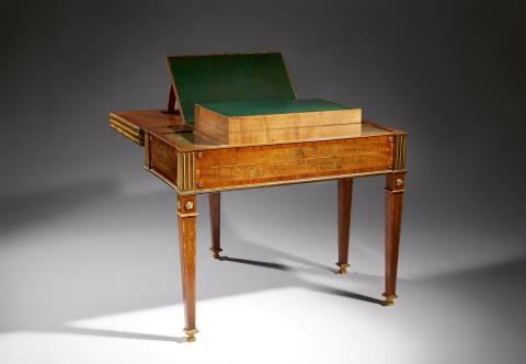 
    
            
                    A rare transformation table by David Roentgen
                
        
