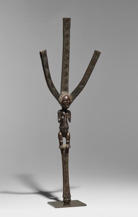 
    
            
                    A Luba kingdom Ceremonial Bow Stand
Democratic Republic of Congo
Wood
Late 19th century
                
        
