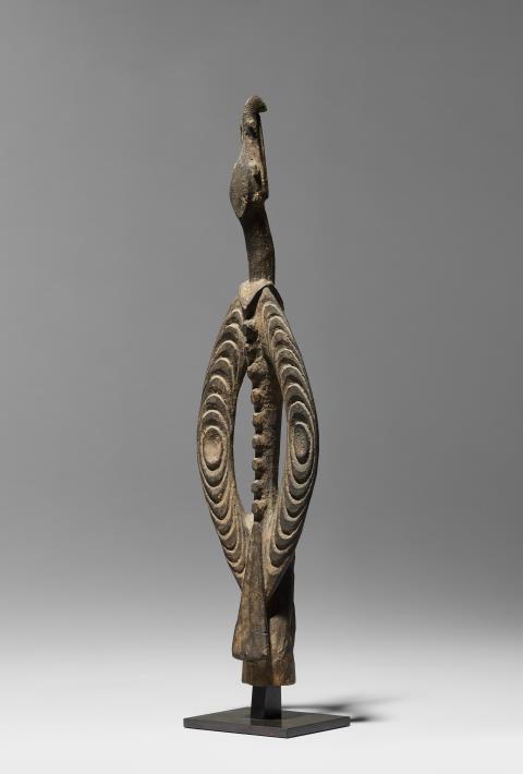 
    
            
                    A fine Iatmul sacred flute stopper
Papua New Guinea
Wood 
Early 20th century
                
        
